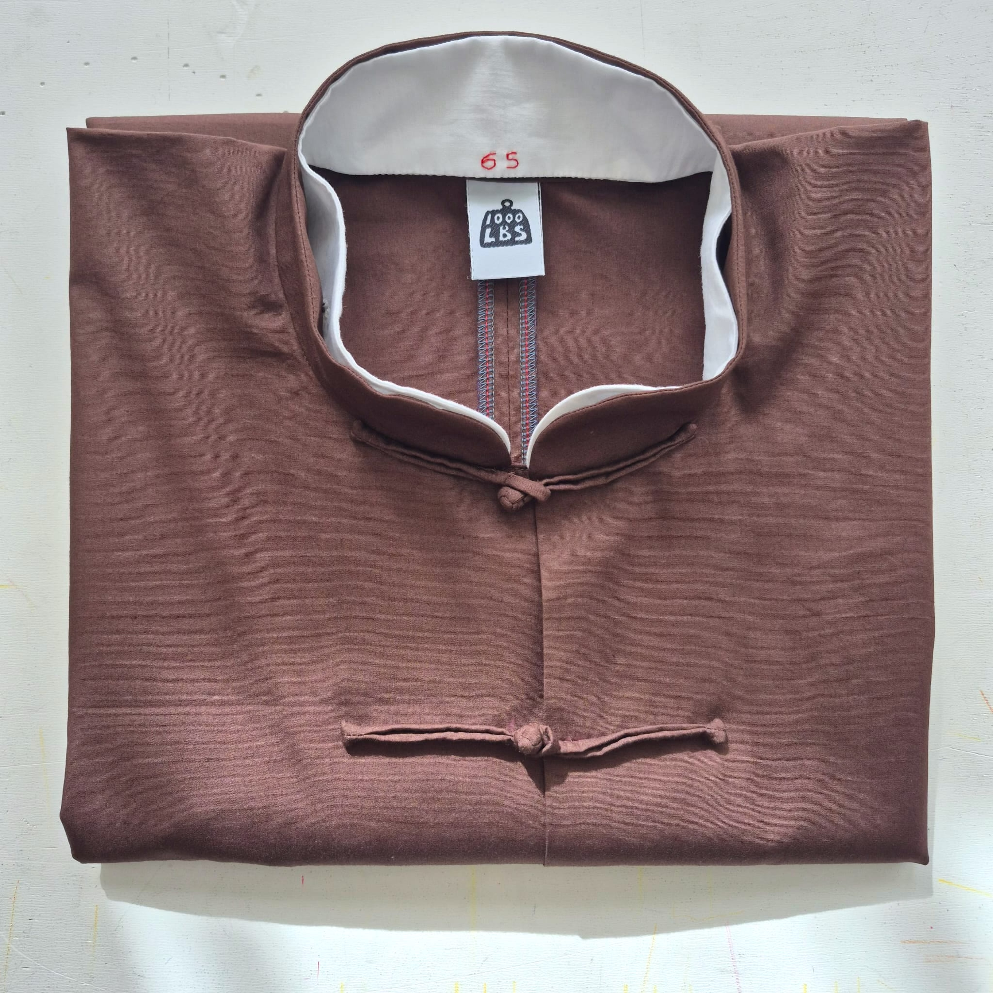 1000 LBS jacket folded